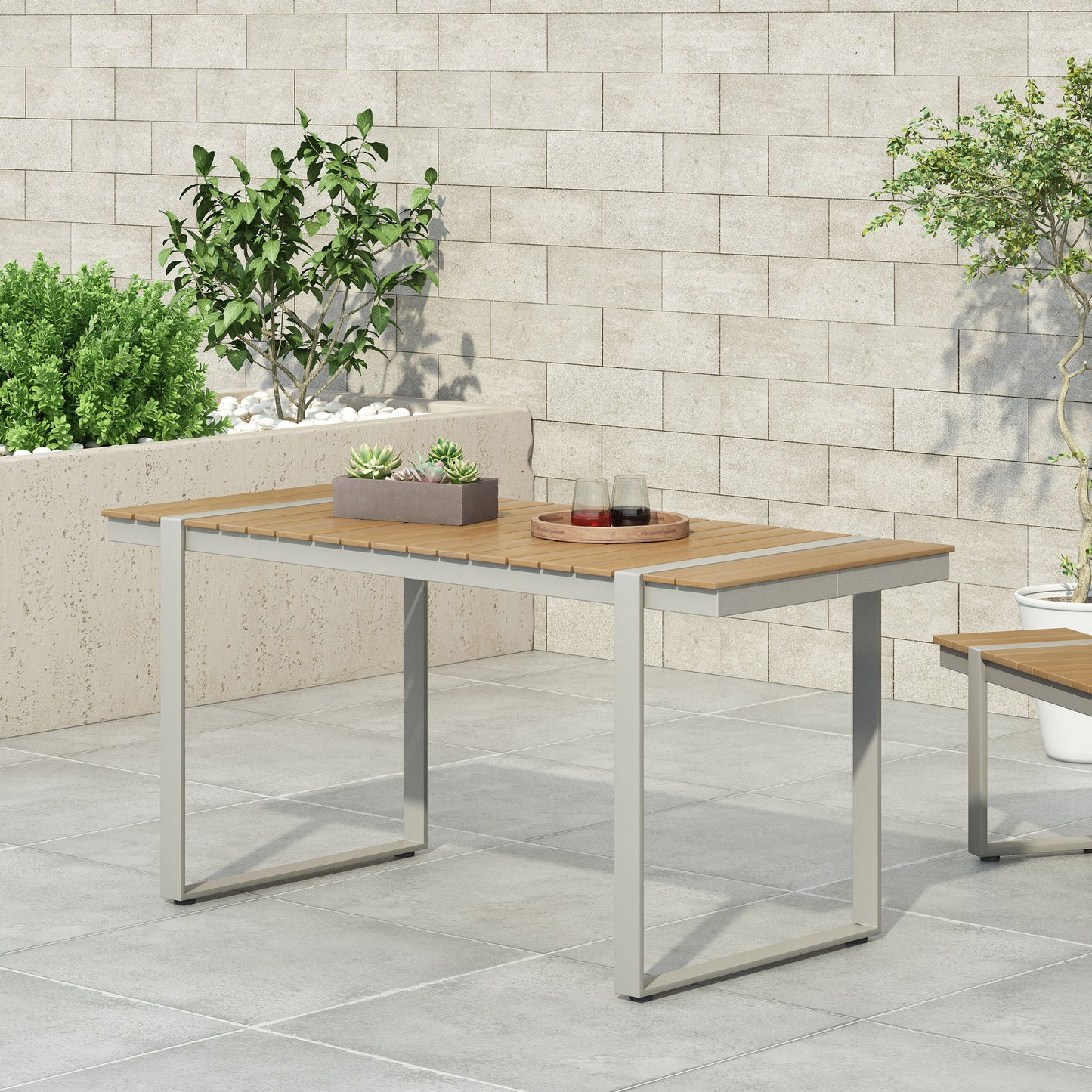 Modern Outdoor Dining Table With Aluminum Frame And Faux Wood Slats
