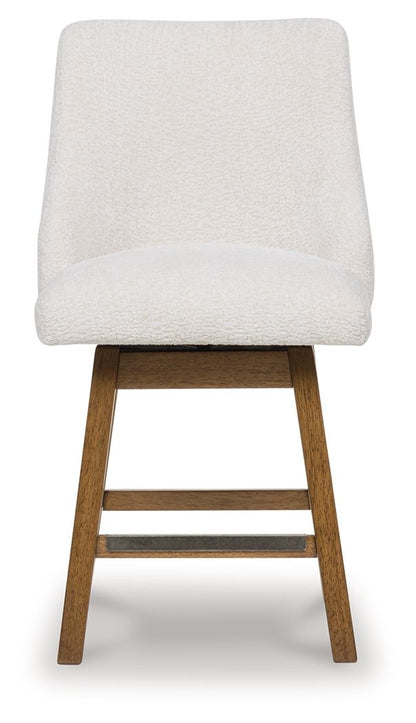 Cabalynn - Oatmeal / Light Brown - Upholstered Swivel Barstool (Set of 2)